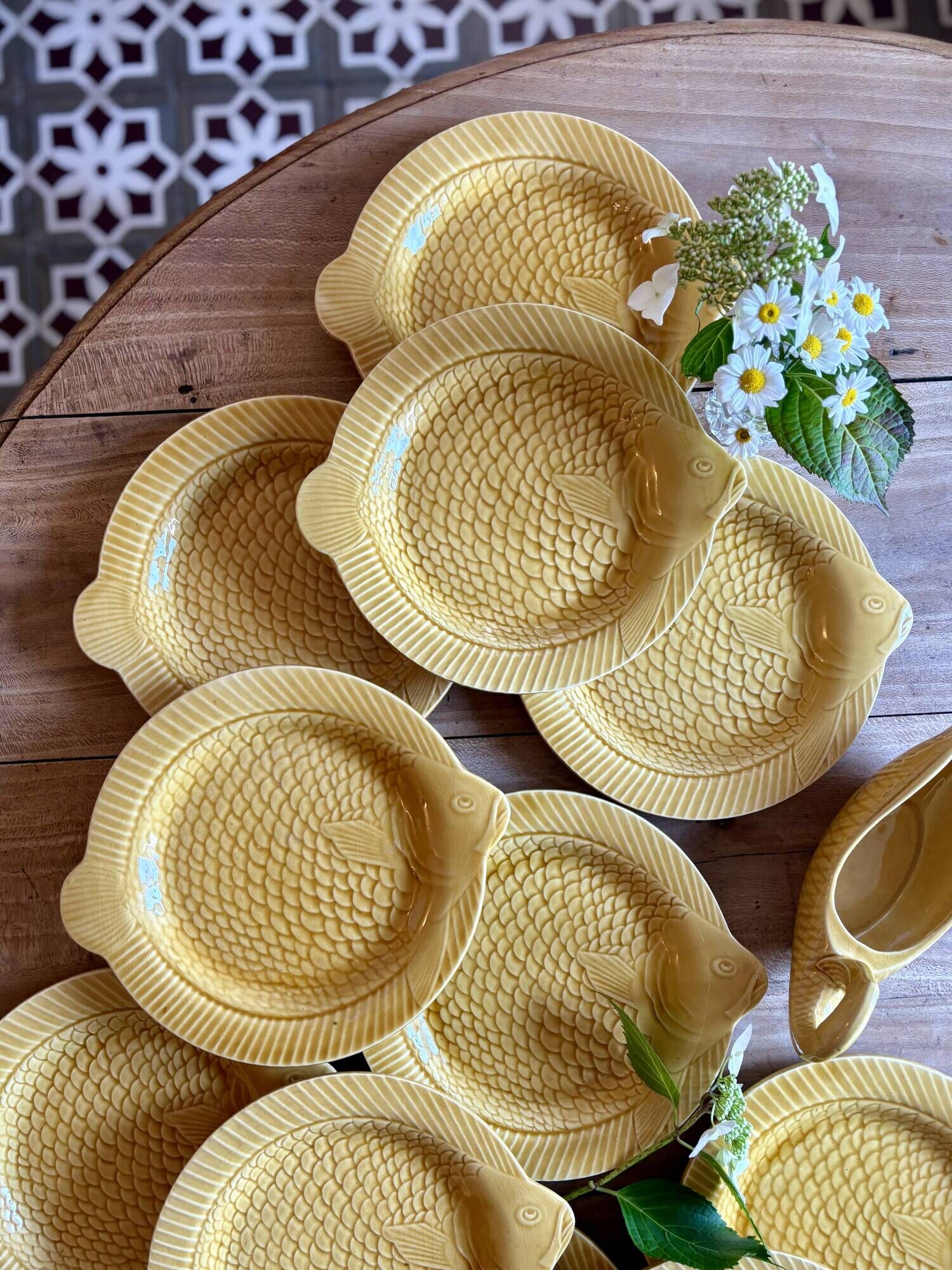 Set of 11 vintage Sarreguemines fish plates and sauceboat