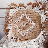 Cushion cover in natural raffia, shells and embroidery in macramé.