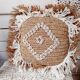 Cushion cover in natural raffia, shells and embroidery in macramé.