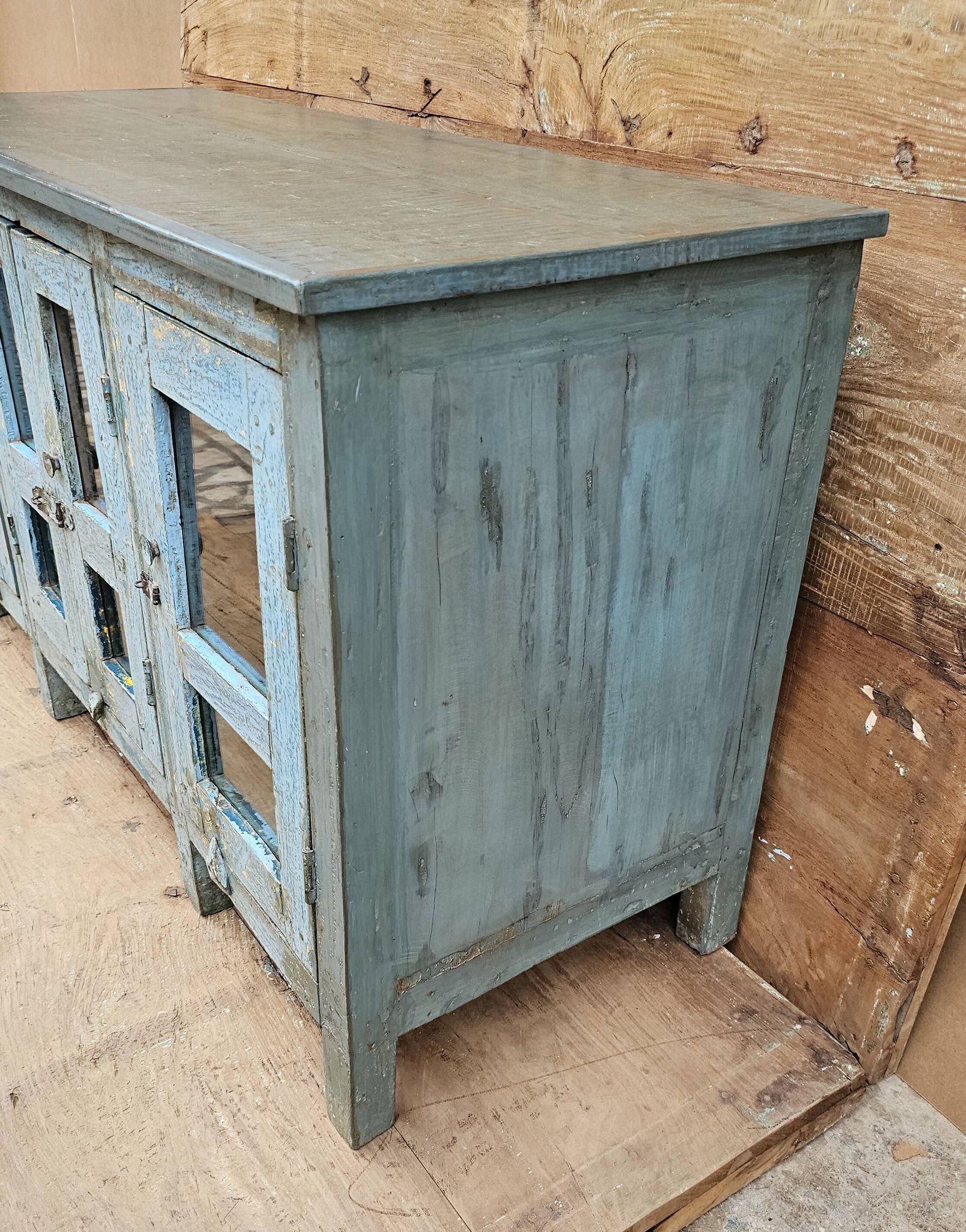 Antique glass-fronted buffet in Burmese teak
