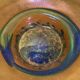 Cup, iridescent glassware, signature
