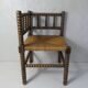 Old corner armchair beaded wood paillé