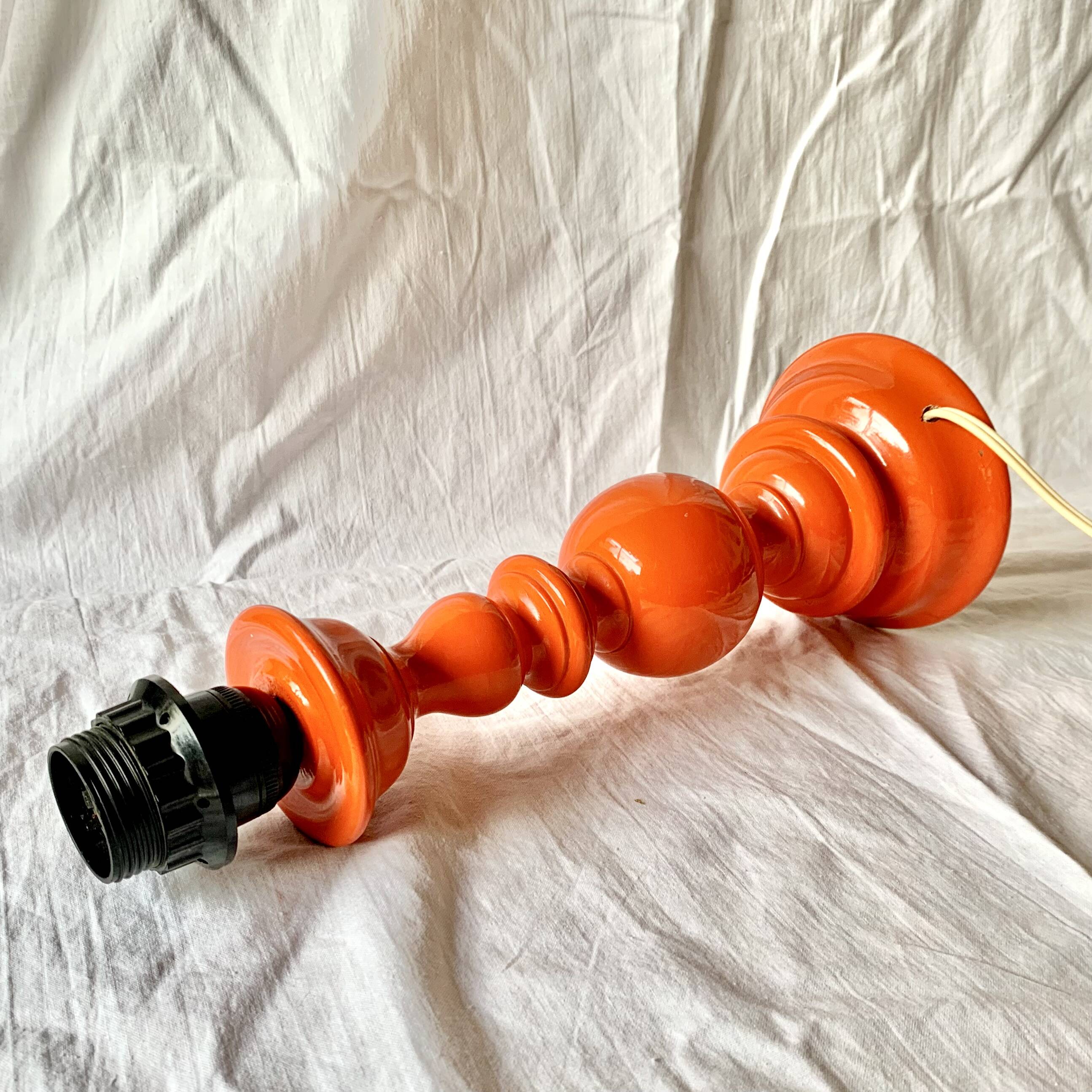 Large vintage lamp base in orange lacquered wood