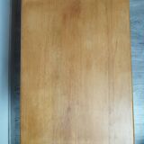 Sled-shaped side table