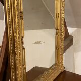 Mirror in wood and gilded stucco