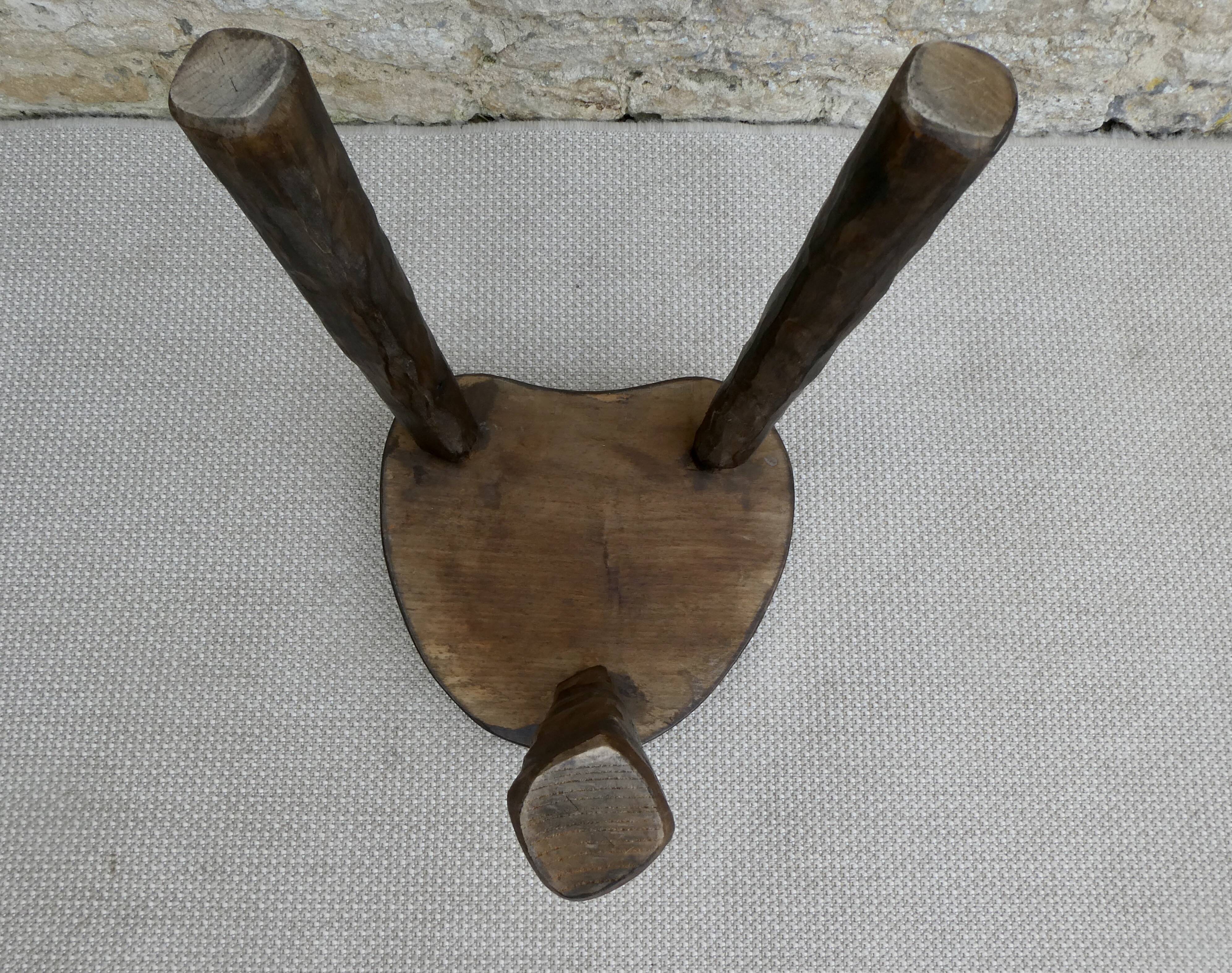 Tripod stool in solid wood, around 1960.