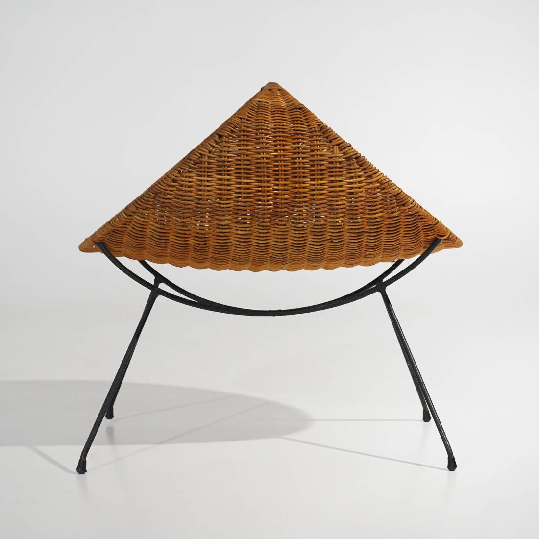 Rattan magazine rack with metal legs, 1950s
