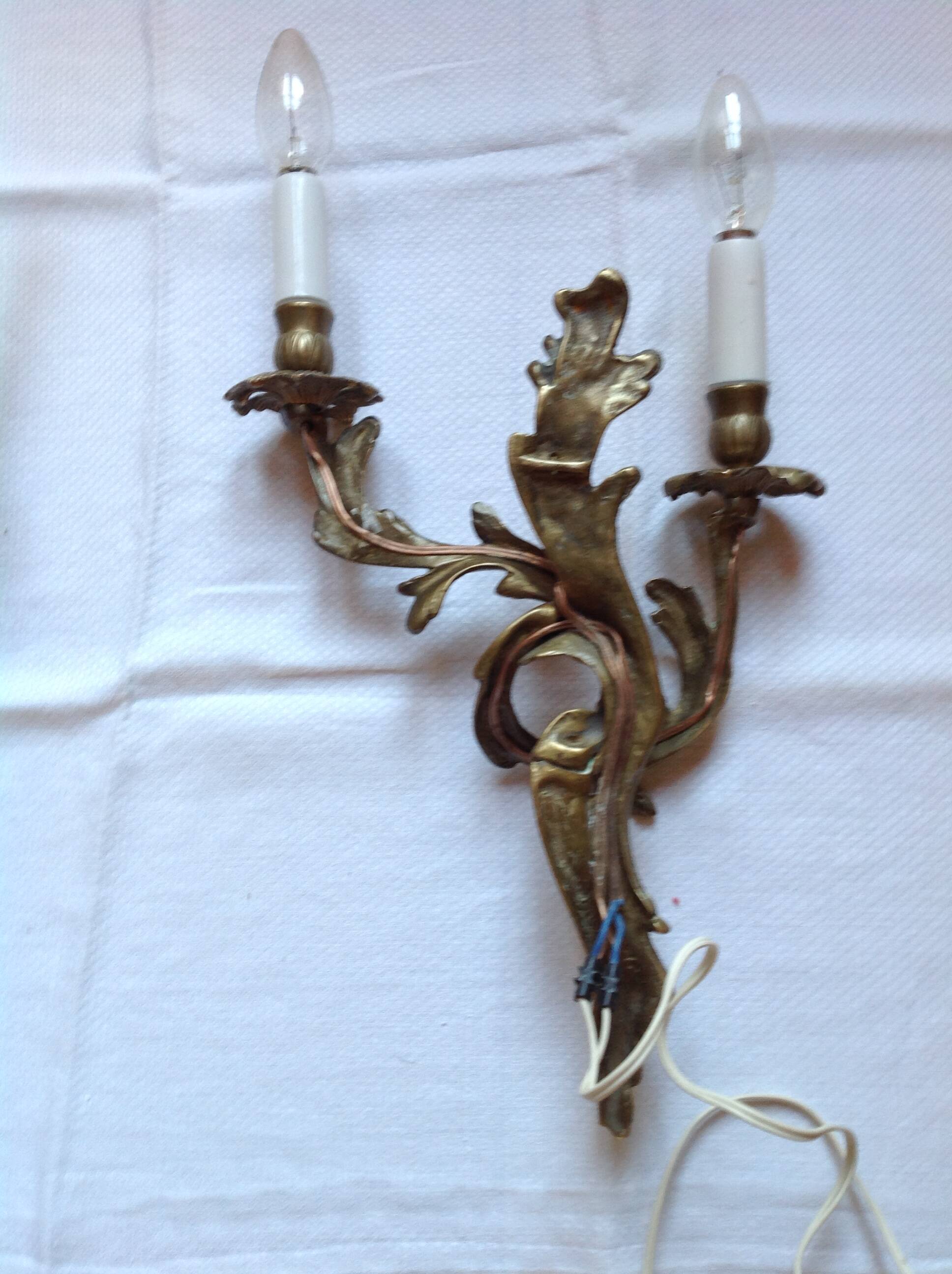 Pair of antique bronze wall lights, early 20th century