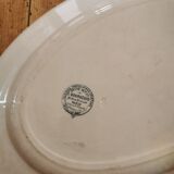 Old oval plate in iron earth