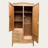 Parisian hotel wardrobe with bevelled mirror, solid raw oak, 1920.