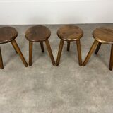 4 wooden tripod stools