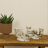 Set of two antique porcelain candle holders