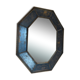old mirror of octagonal shape.