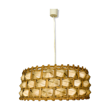 Suspension rattan and palm leaves chic jungle style