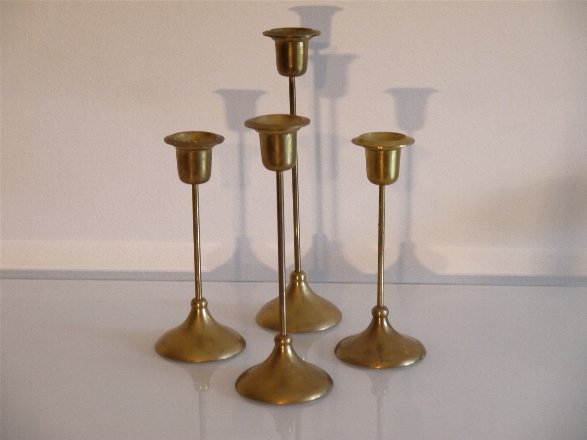 Batch of 4 vintage scandinavian brass candlesticks