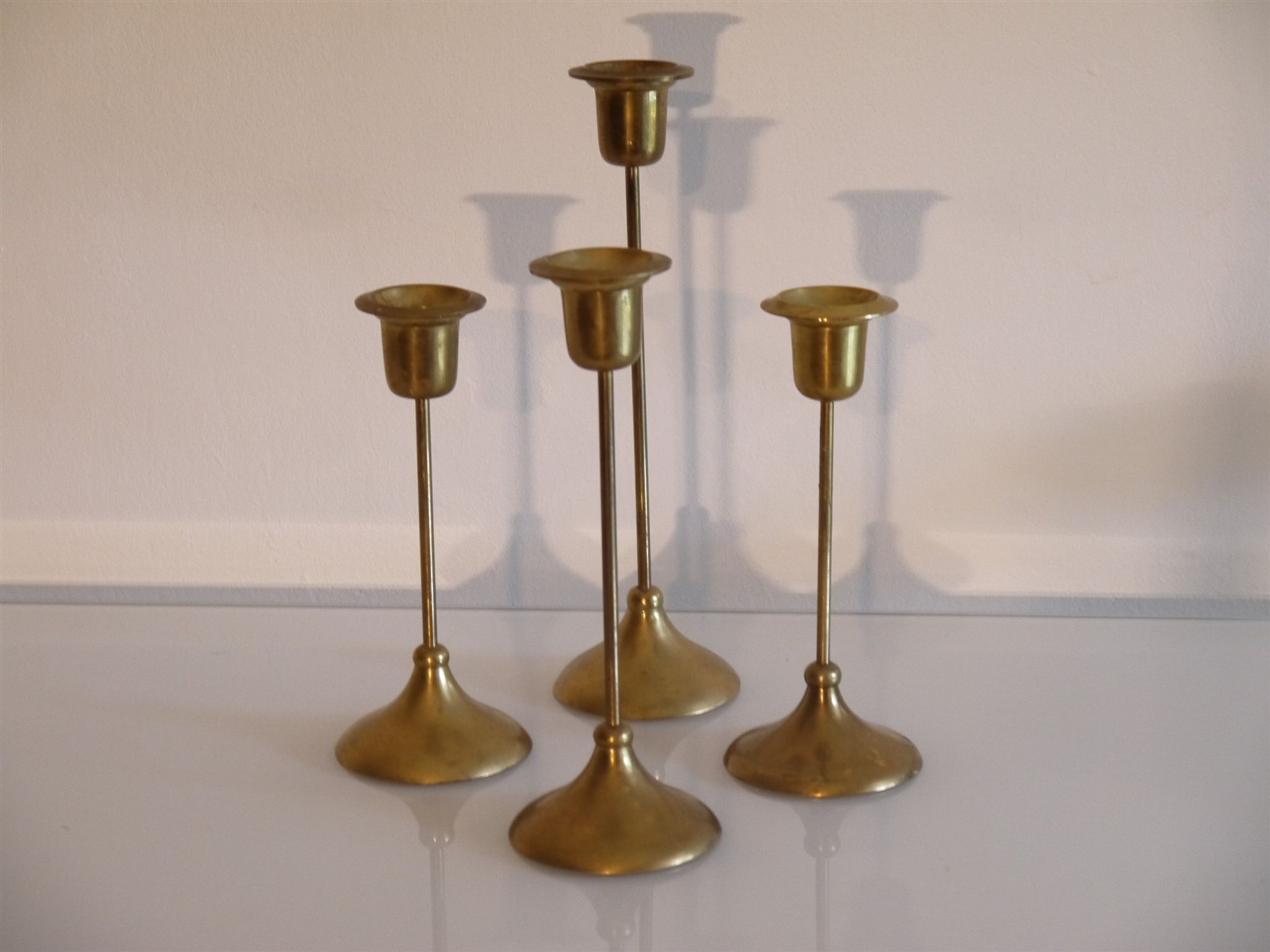 Batch of 4 vintage scandinavian brass candlesticks