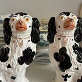 Pair of black Cavalier King Charles dogs in Staffordshire pottery, 19th century.
