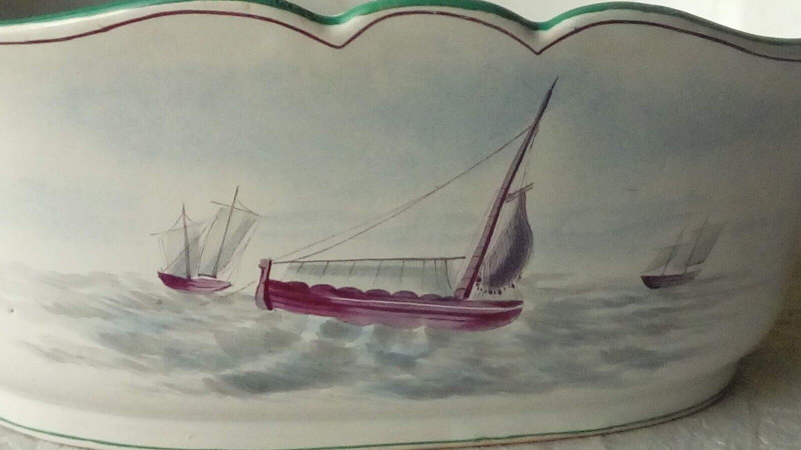 St Clement faience jardiniere with marine and swan decoration, early 20th century.