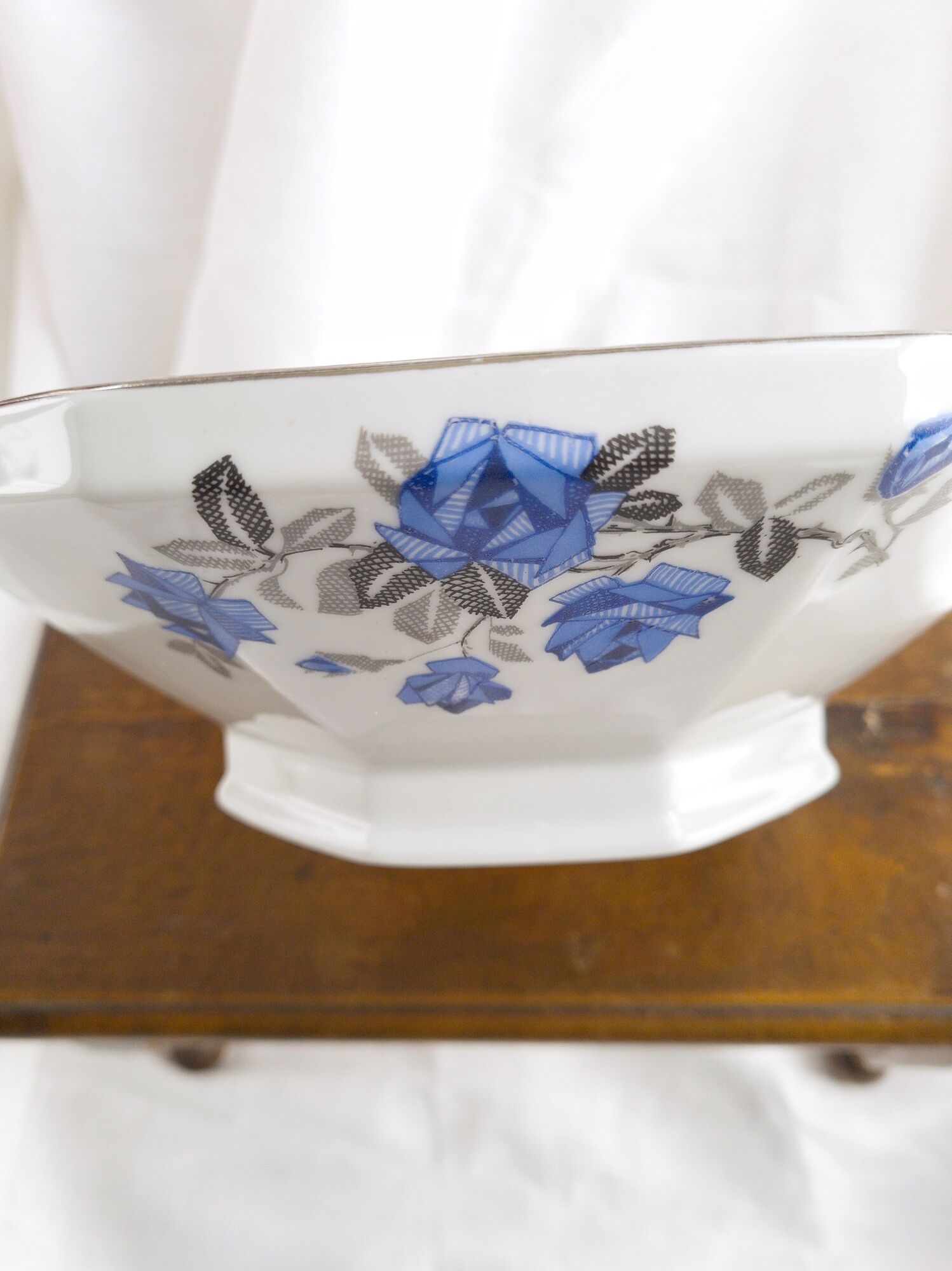 Old porcelain hollow dish of Limoges blue flowers