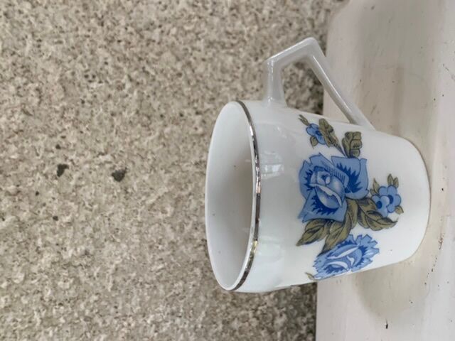 Coffee service in white porcelain pattern pink blue art deco