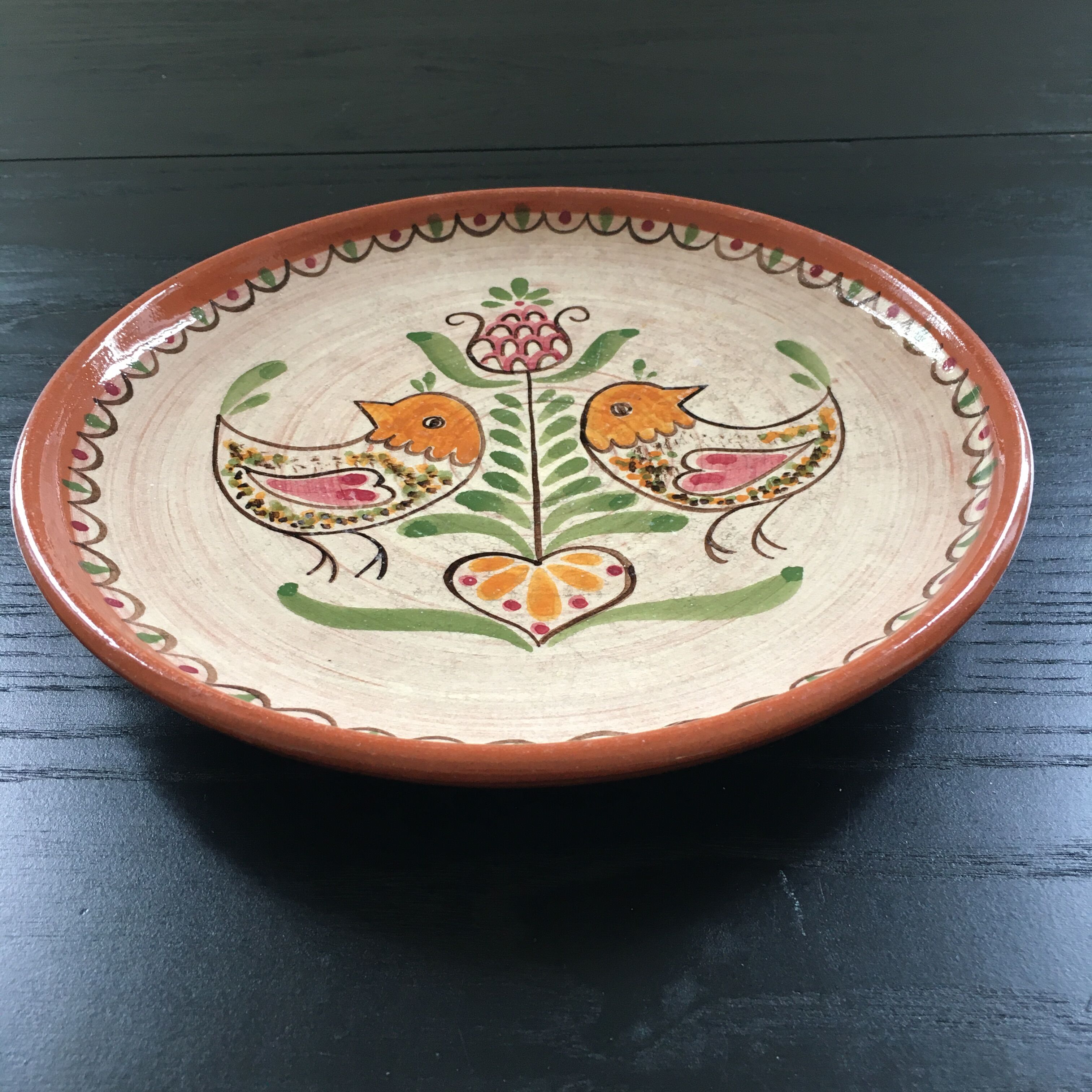 Decorative plate with birds, signed.