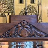 Art deco mirror in carved walnut