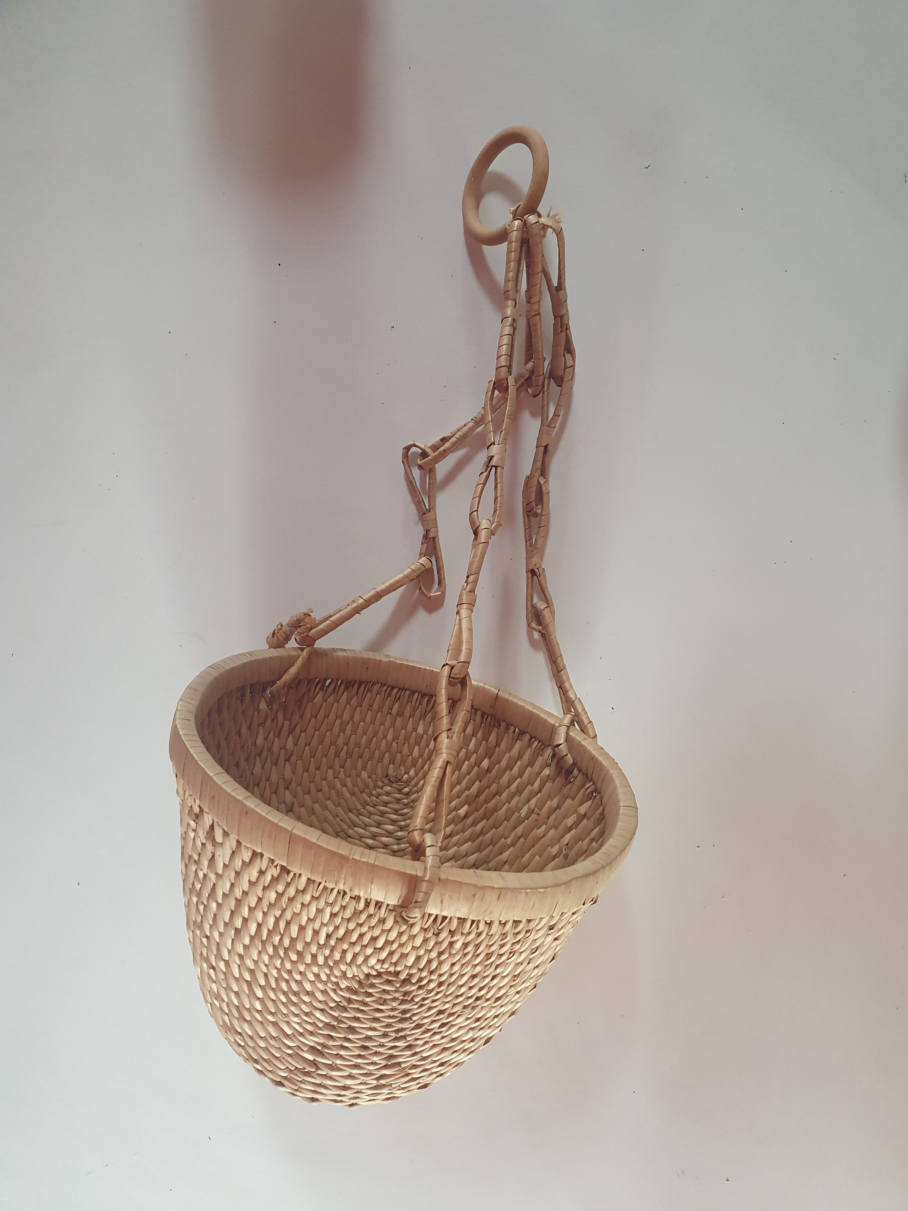 Rattan basket to hang vintage plant door