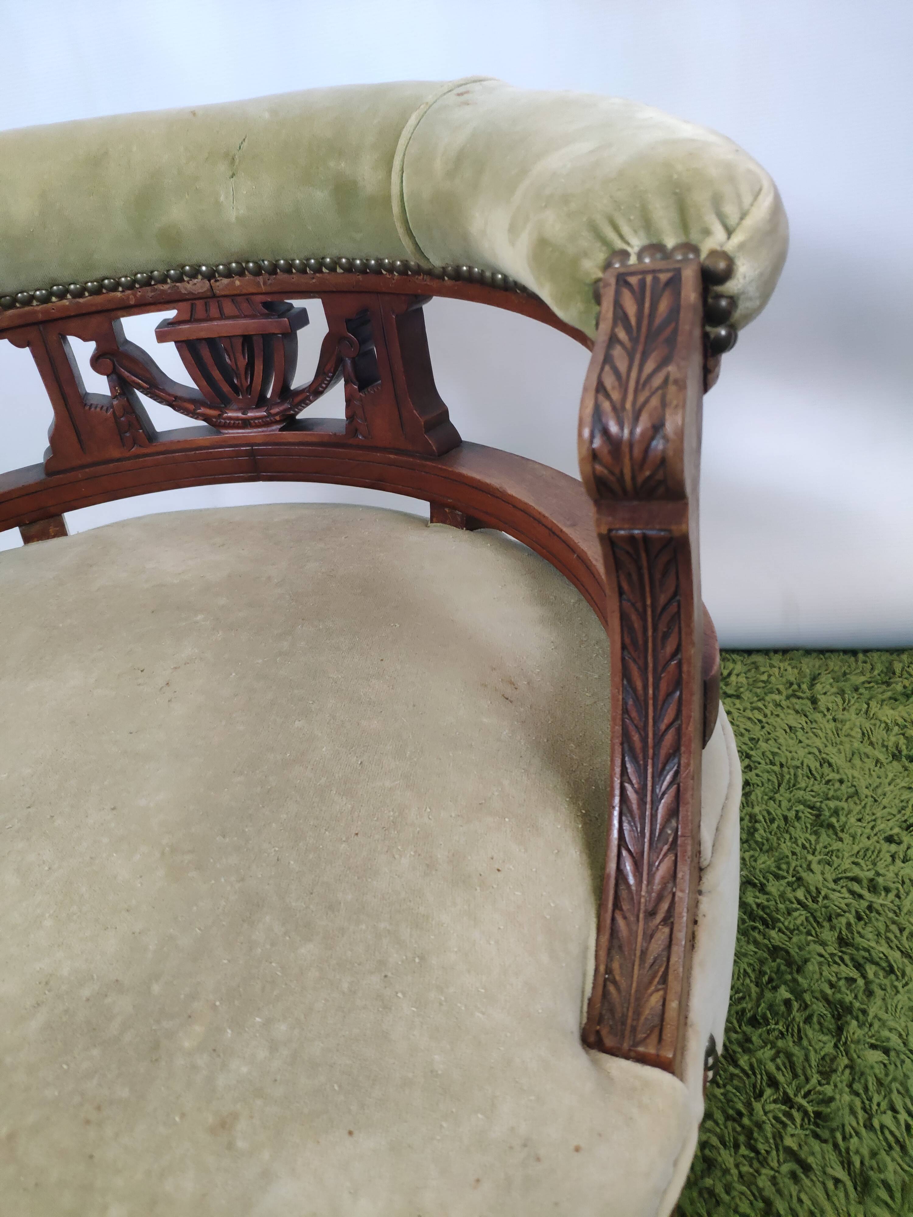 Old green velvet empire chair