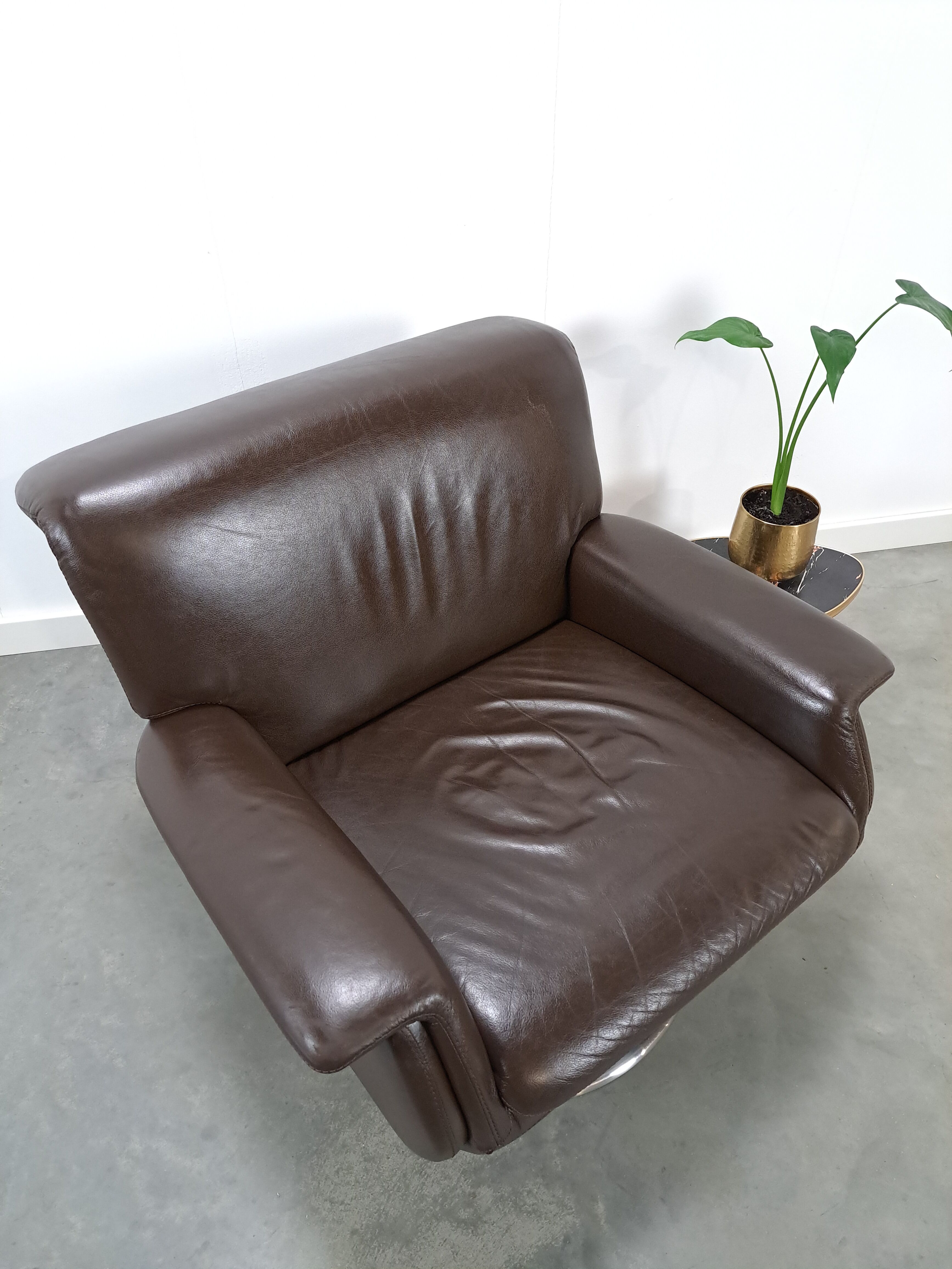 Brown leather swivel chair