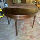 Half-moon table in mahogany, Louis XVI style.