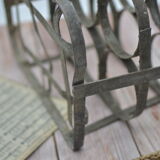 Old metal bottle holder