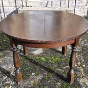 Round wooden table with 1 integrated extension + 6 wooden and fabric chairs