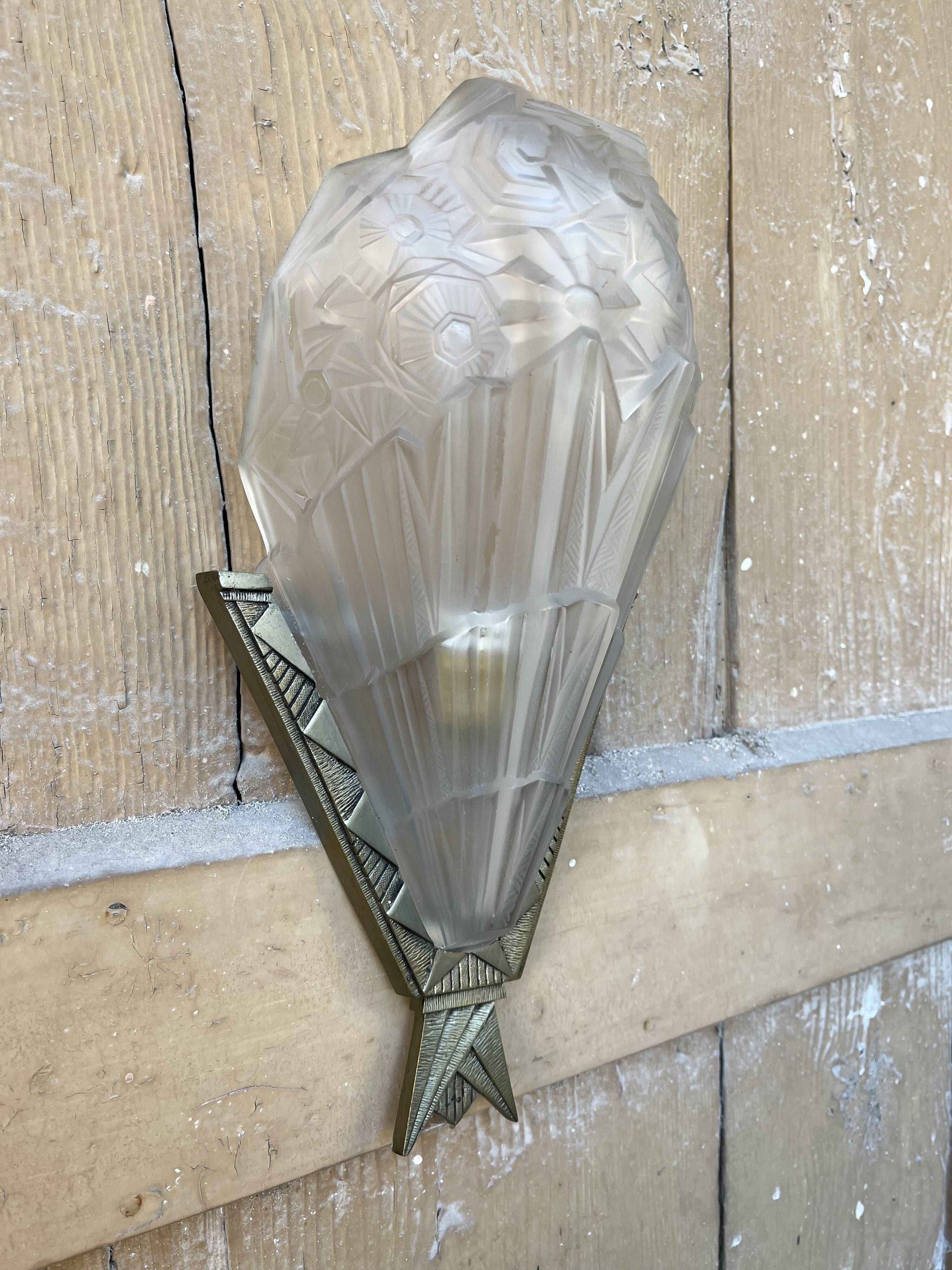 Signed art deco wall light