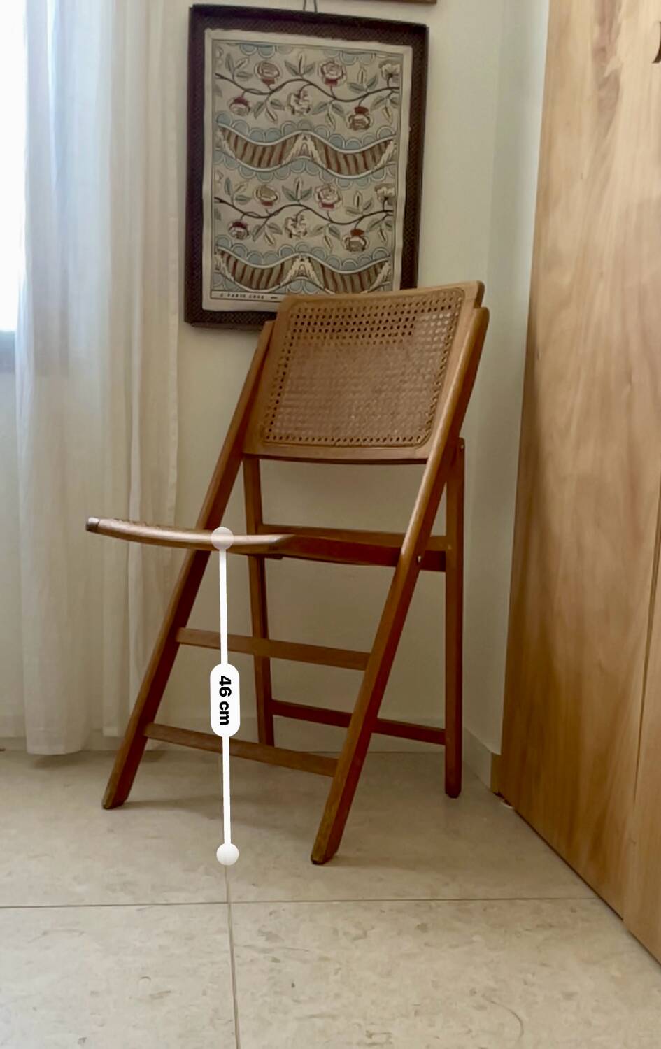 Folding wooden and cane chair