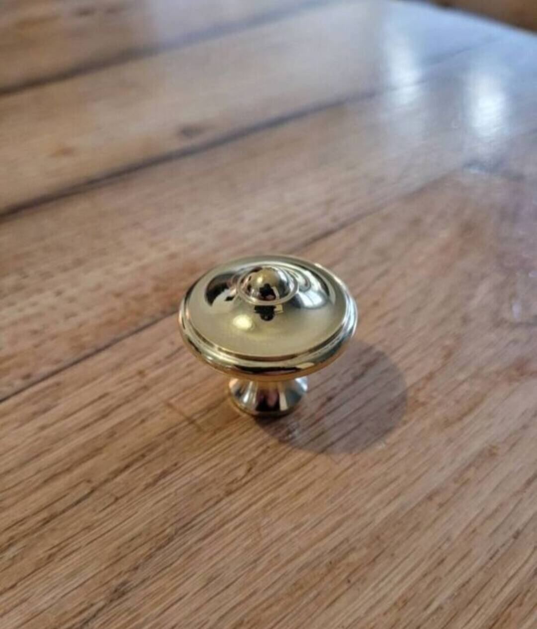 6 polished brass furniture knobs