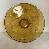Yellow glass cup with flower pattern