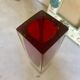 Small red vase made of Murano glass.