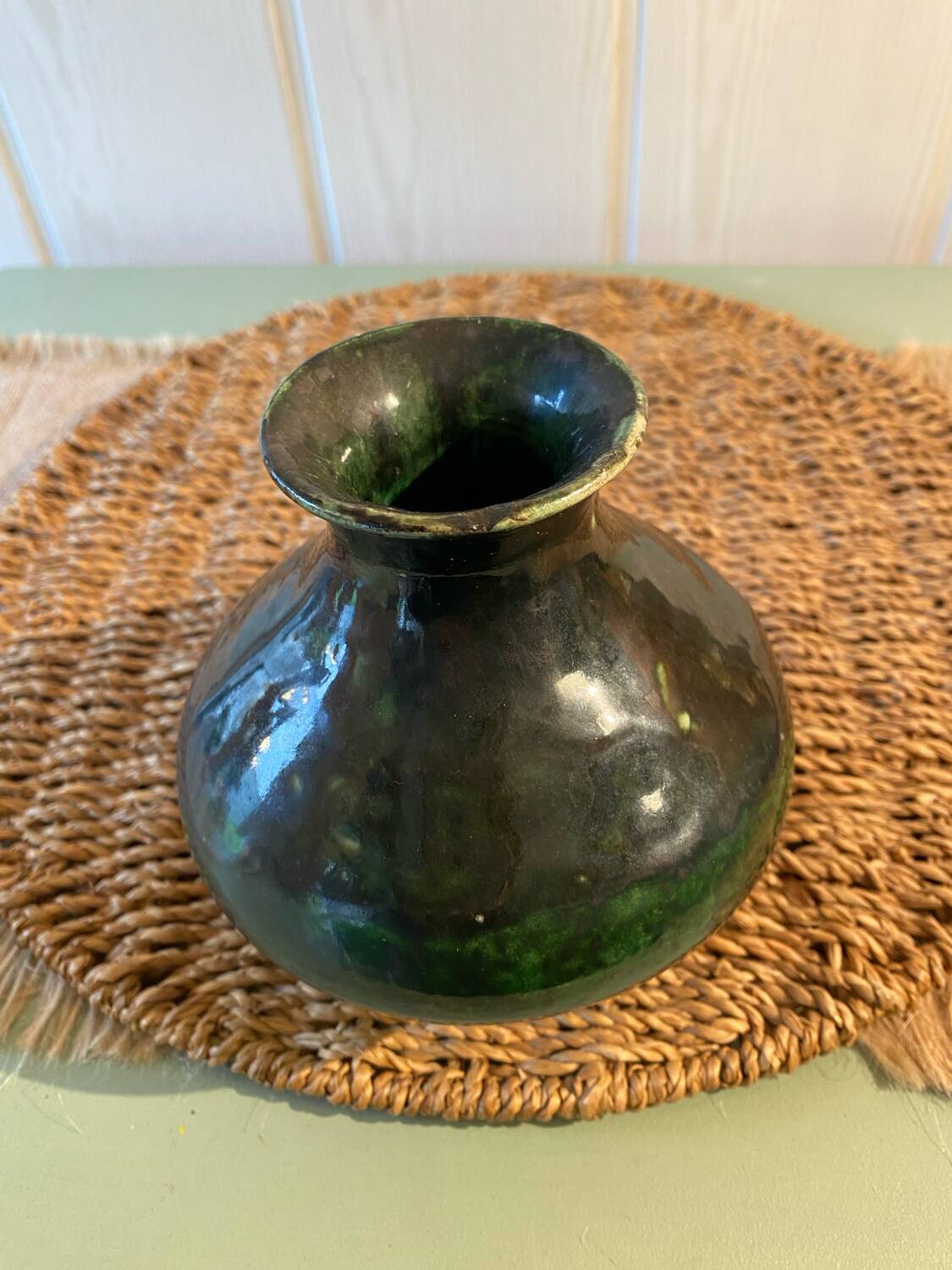 Small green glazed terracotta vase