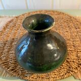 Small green glazed terracotta vase