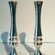 Pair of silver metal candle holders