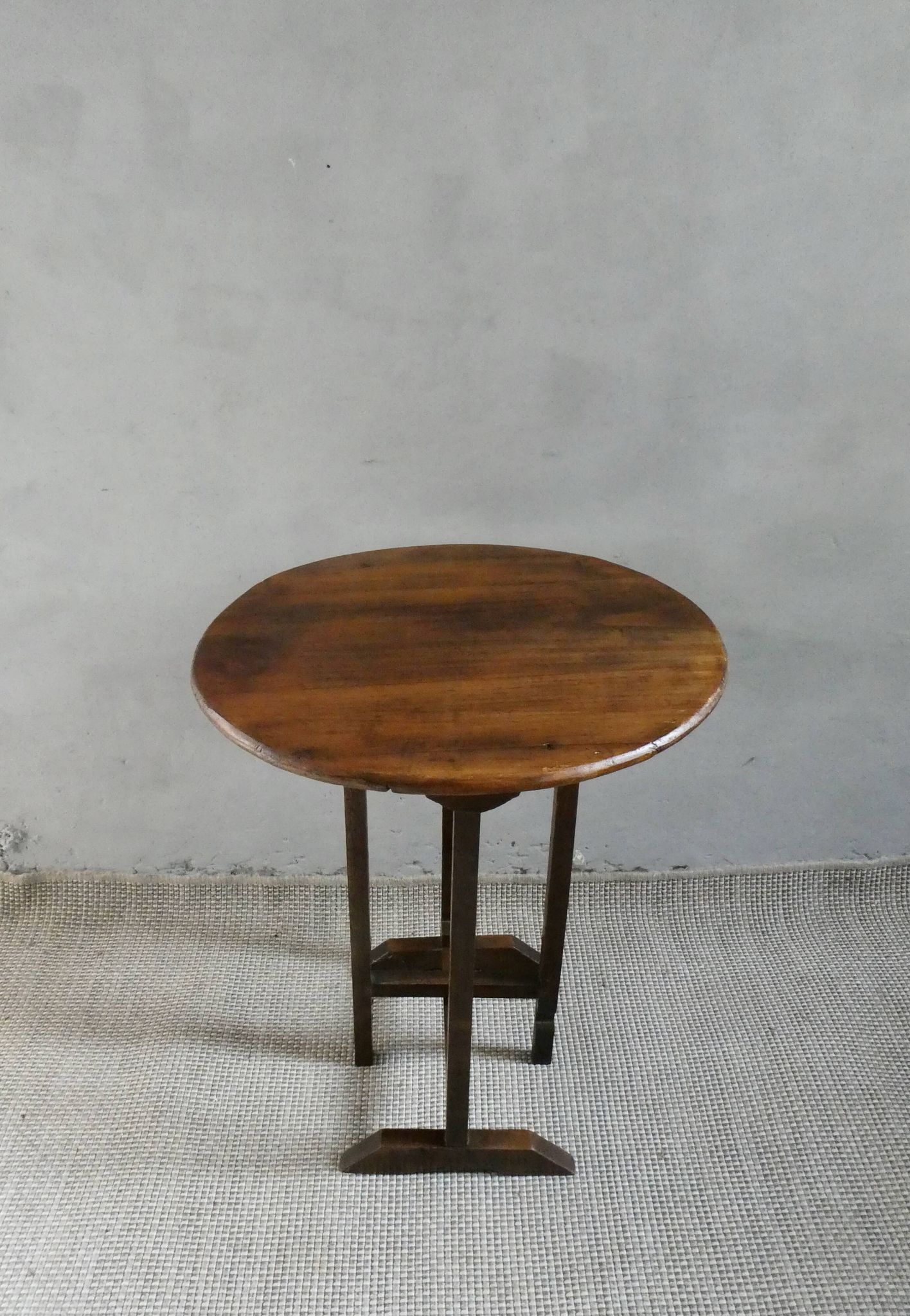 Small table known as a winemaker's table.