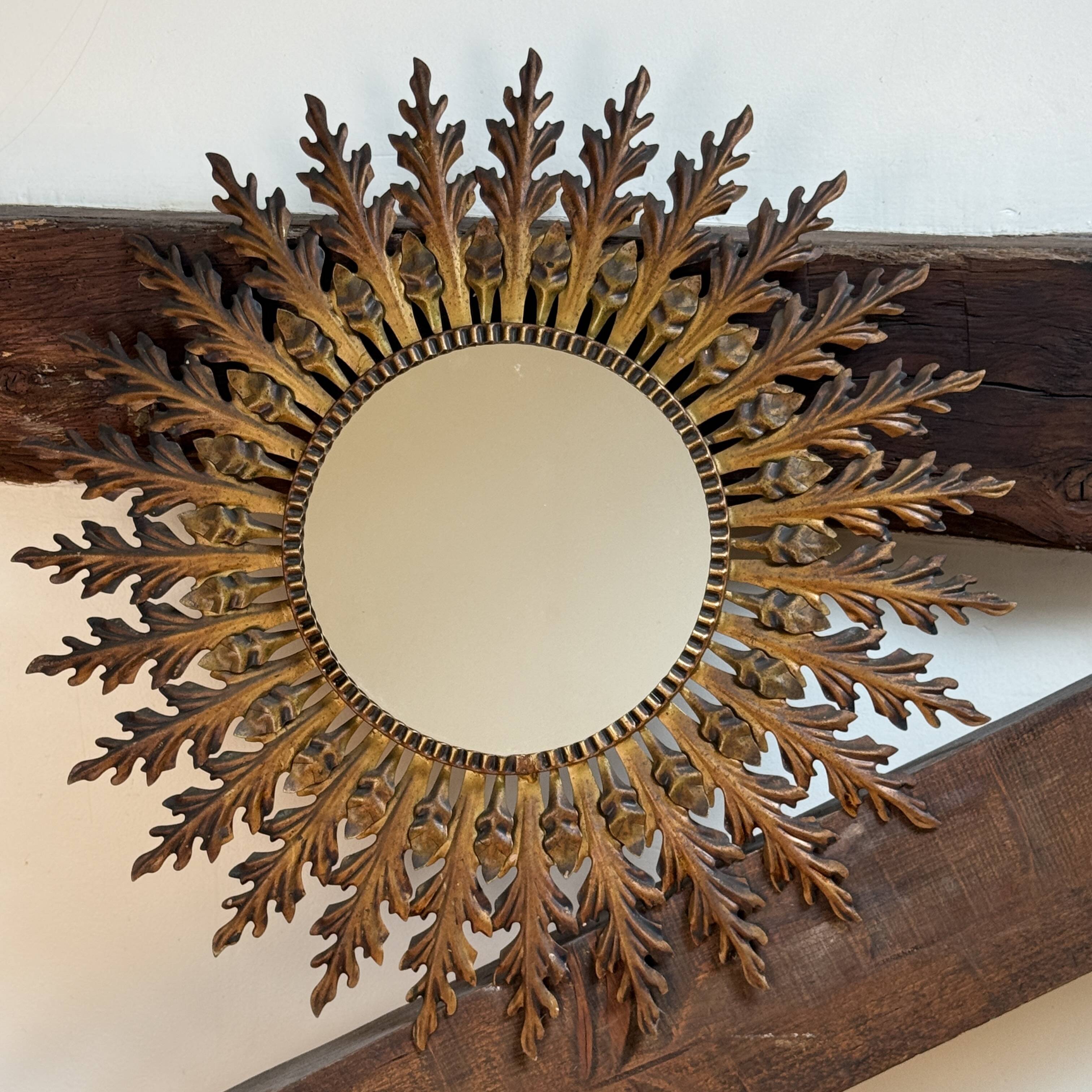 Magnificent sun mirror from the 1950s Italy.