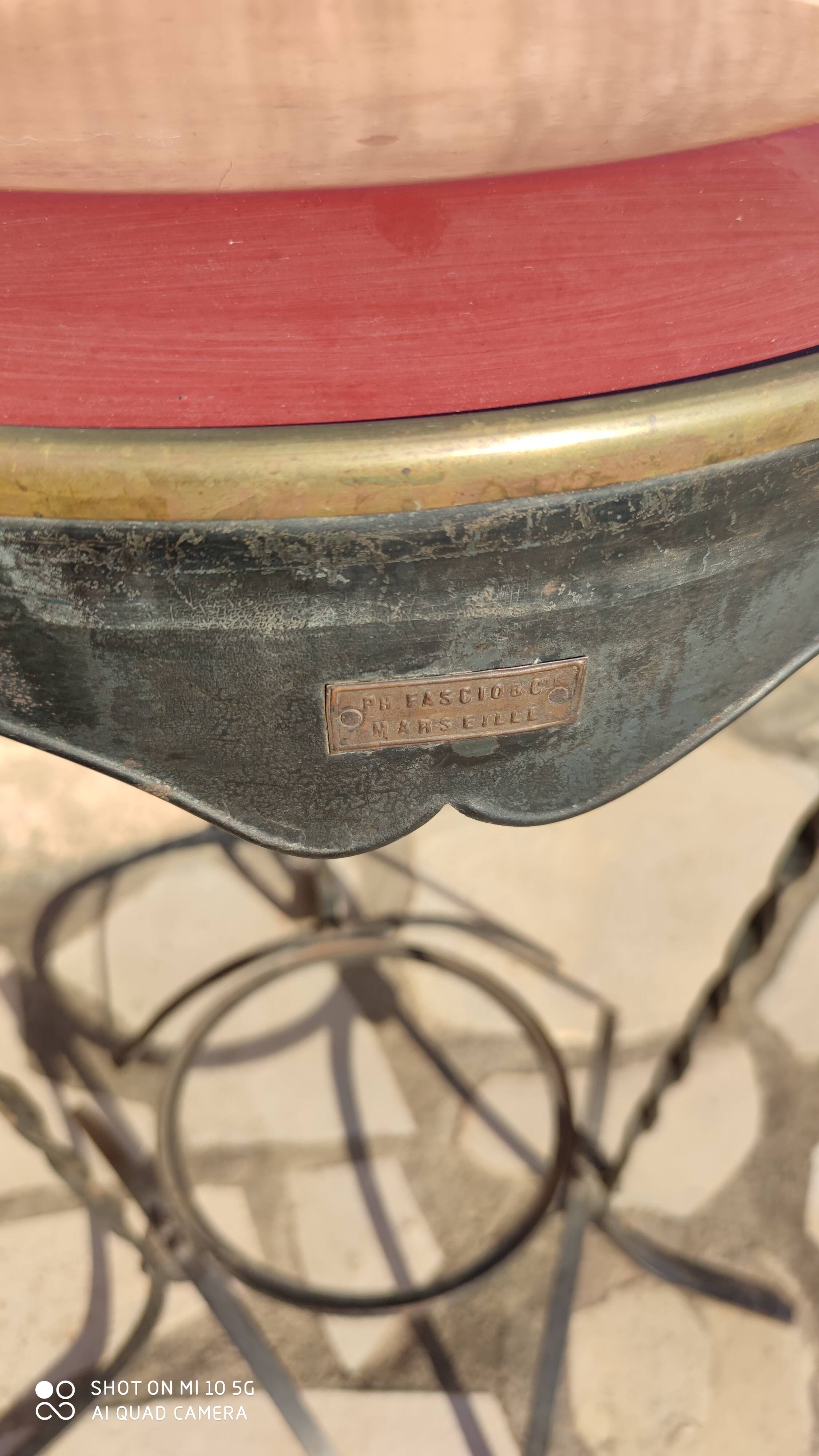 Painted and enameled sheet metal side table