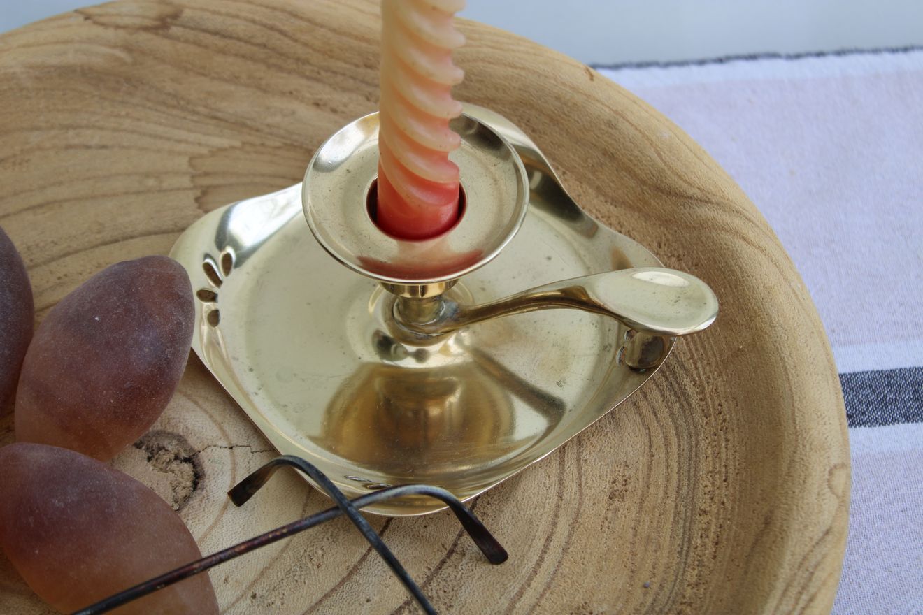 Golden brass candle holder