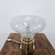 1970s table lamp in worked glass and gold metal