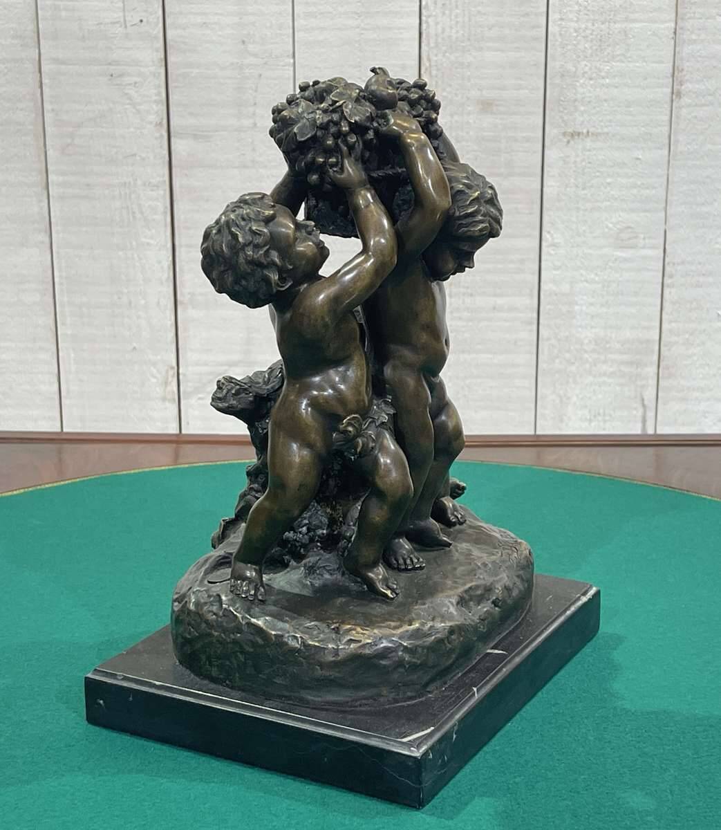 Bronze piece depicting 3 cherubs signed J. DASTE - 1950s