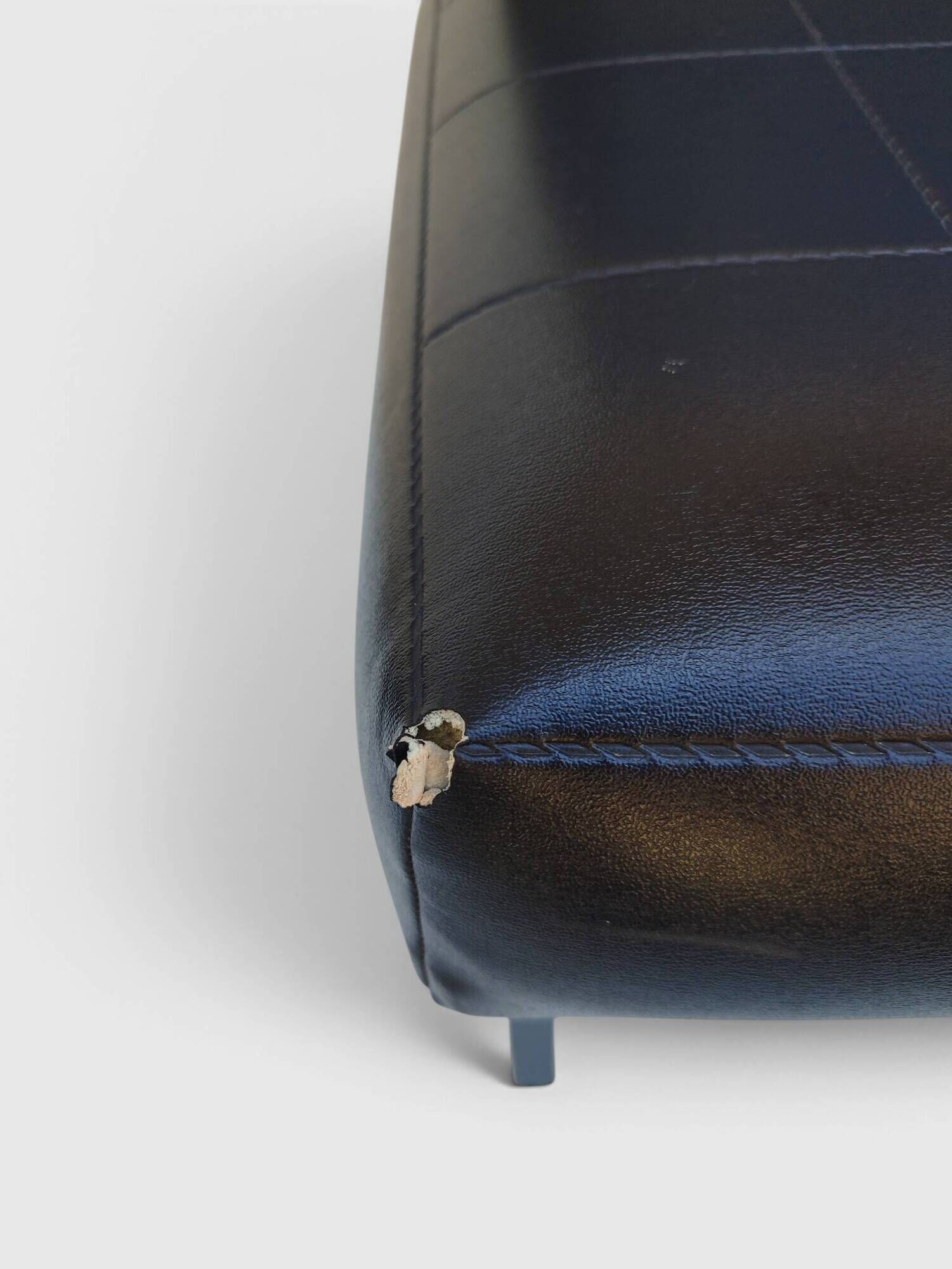 Modernist armchair in black faux leather and metal – 1960s