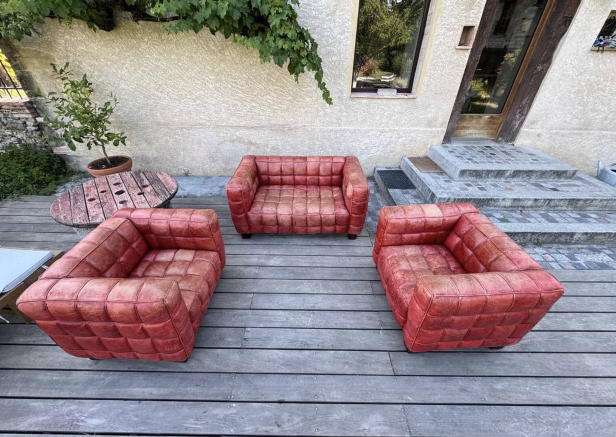 Set of sofas, red leather, 1980s reissue