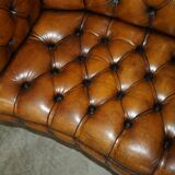 Vintage Chesterfield serpentine luxury sofa in restored leather