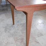 Table with two extensions and its 6 chairs scandinavian teak of the 1970s